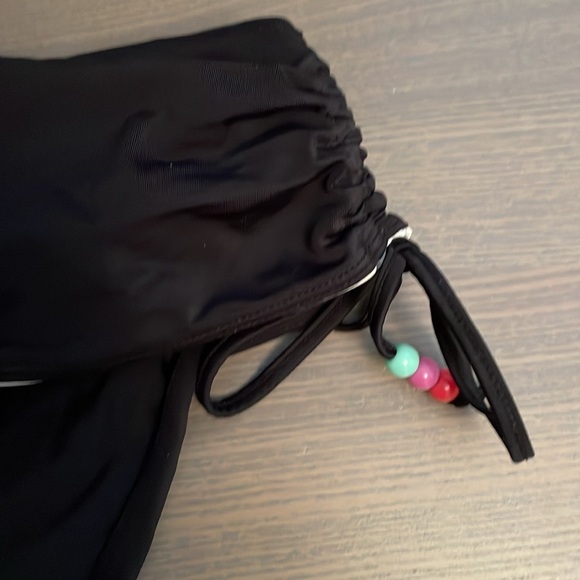 Black bikini bottom size 8 USA. Fold over waist with drawstring sides. - Picture 2 of 13